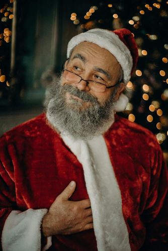 Weihnachtsmann bei einer Fotosession